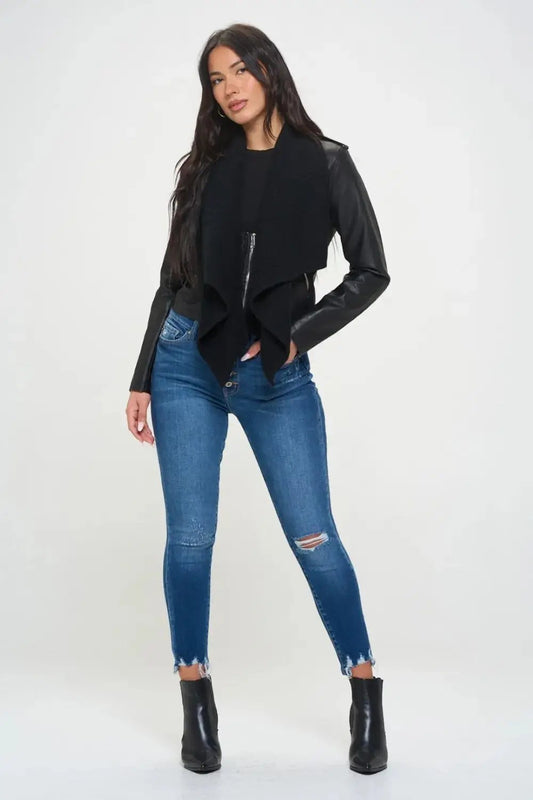 Coalition LA Knit Collared Faux Leather Crop Jacket styled with jeans.