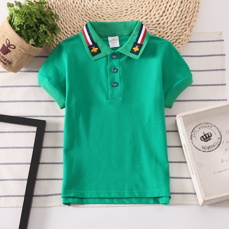 Green personalized children's T-shirt with short sleeves and striped collar, made from 100% cotton.