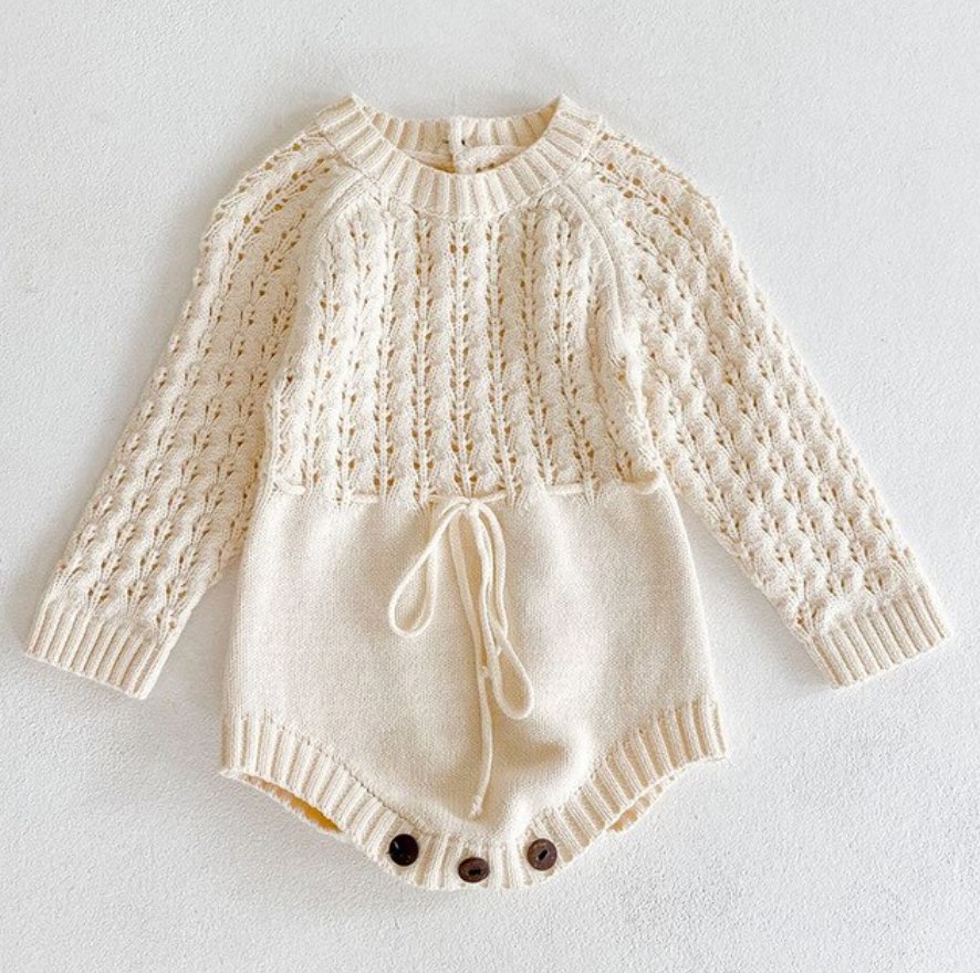 Girl baby knitted dress with hollow waist girdle triangle design and long sleeves.