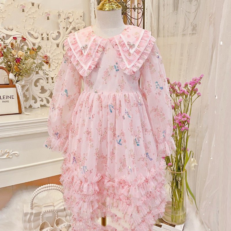 Girls' pink floral princess western style gauze dress with long sleeves.