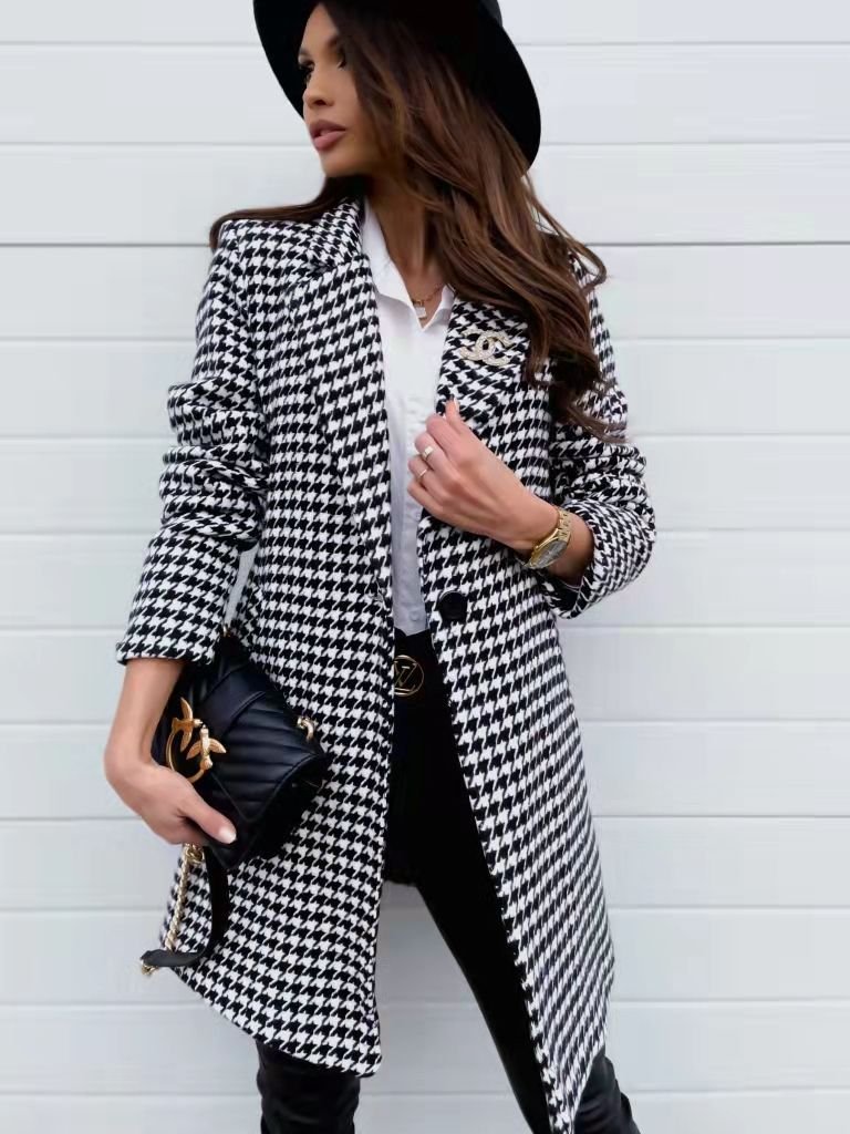 Checkered blazer with long sleeves and one-button closure, perfect for smart-casual occasions.