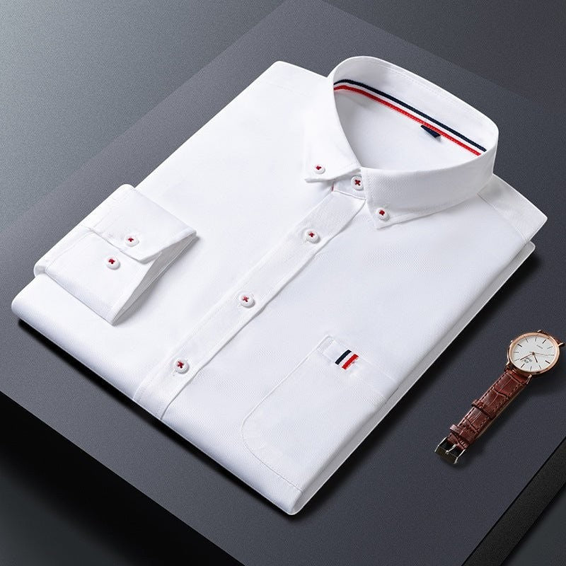 Men's white casual business dress shirt folded, showcasing classic style suitable for professional occasions.