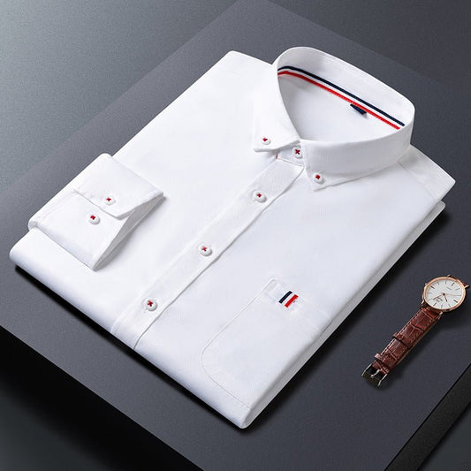 Men's white casual business dress shirt folded, showcasing classic style suitable for professional occasions.