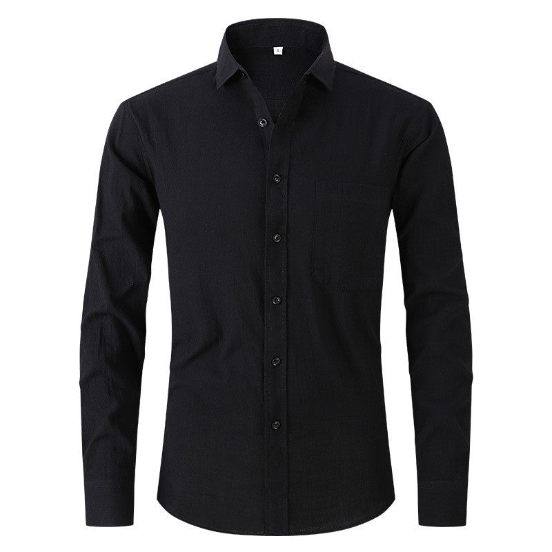 Men's black linen solid color long sleeved business slim fitting dress shirt on display.