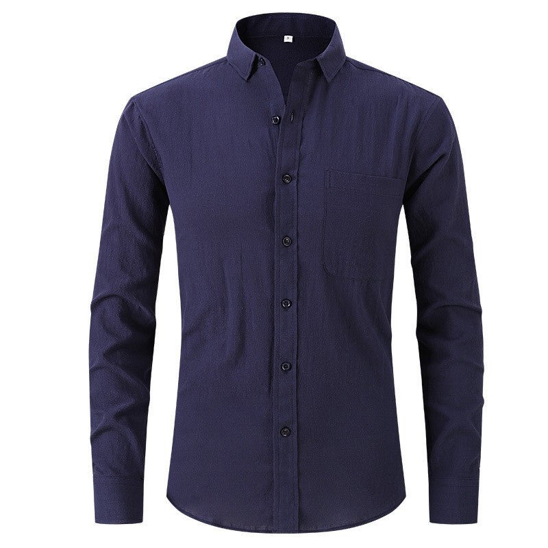Men's navy blue linen solid color long sleeved slim fitting business dress shirt.