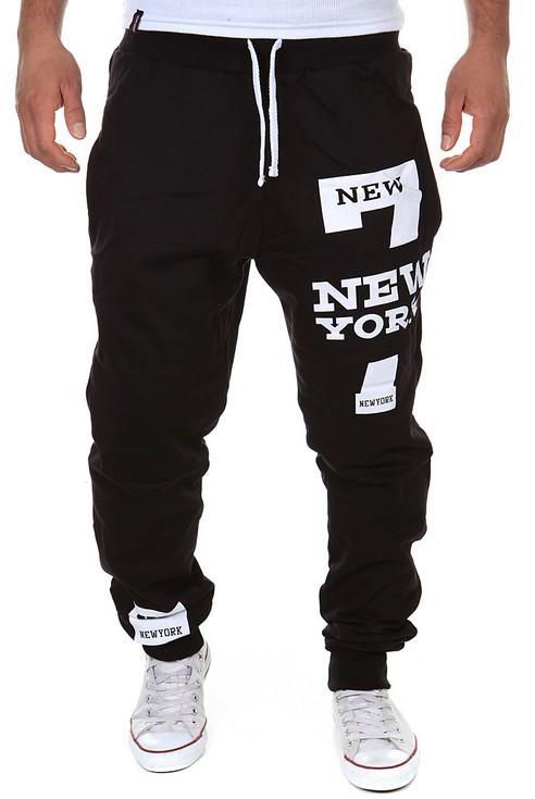 Black cotton men's joggers with "New York" text design, featuring a drawstring waist.