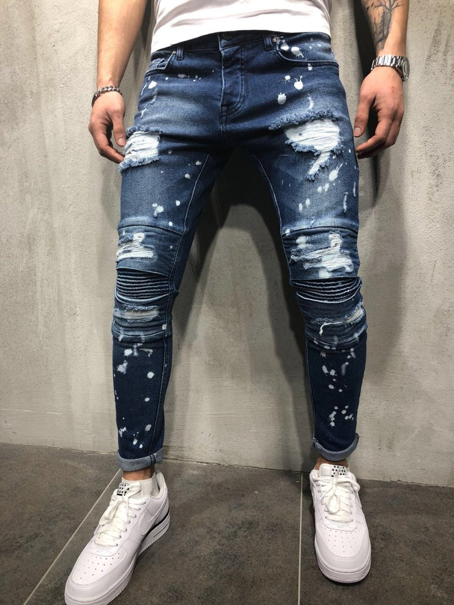 Men's slim feet jeans with holes and knee pleats, motorcycle style.