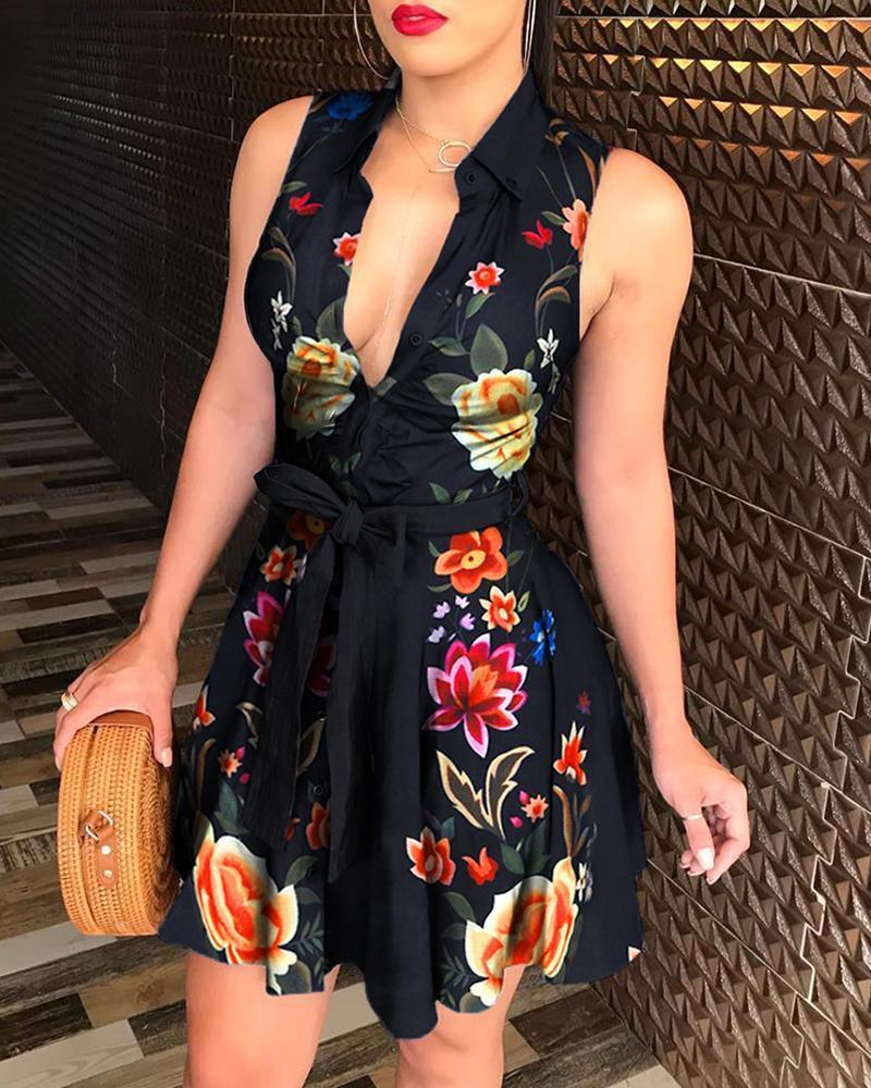 Casual women's V-neck printed dress with floral pattern and elastic waist.